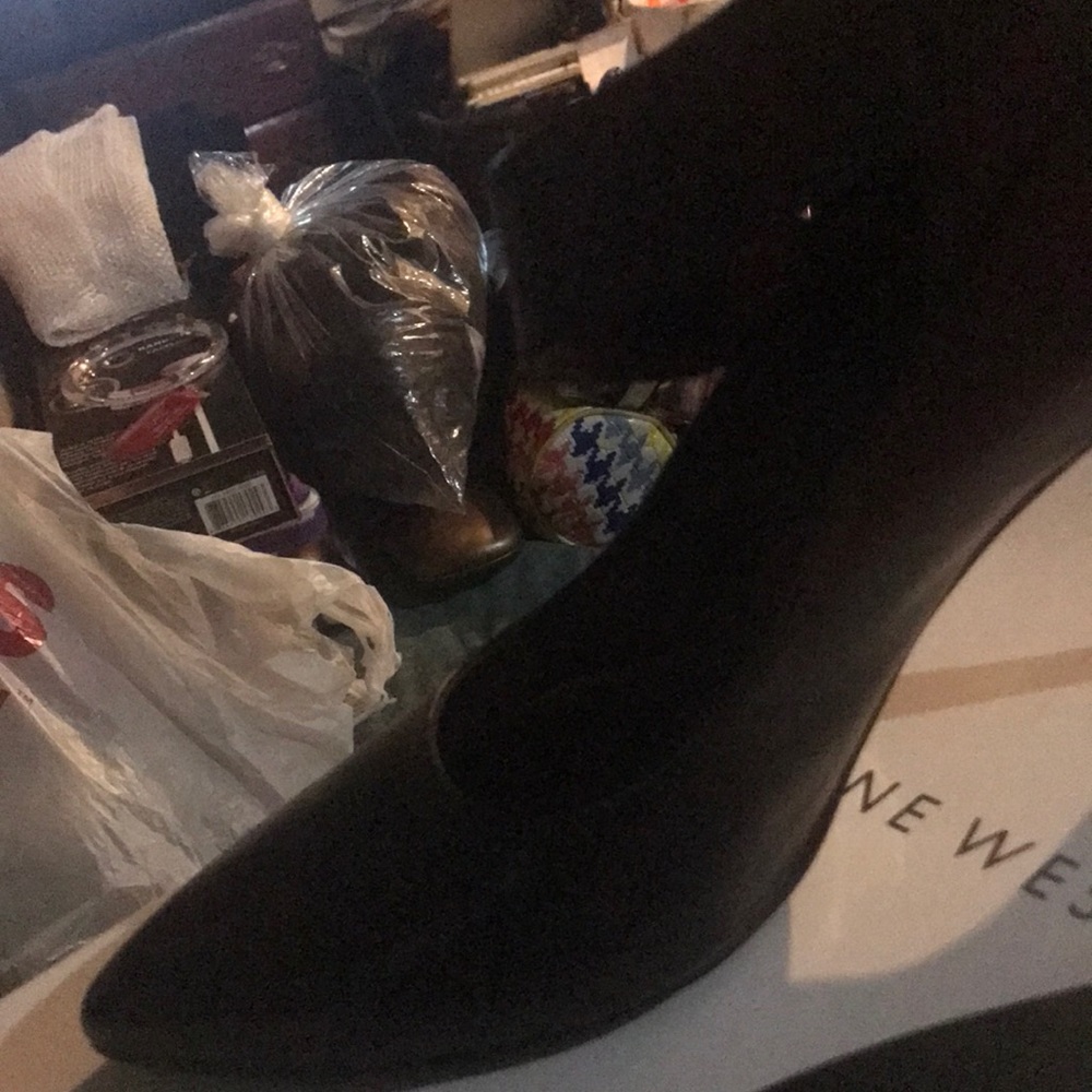 Nine West black Wrap around anklet pump With 3 and a half inch heel.